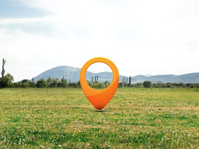 location-symbol-with-landscape-background